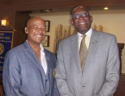 Rotary II President Erik Baynes (left) and new honorary member UVI President David Hall.